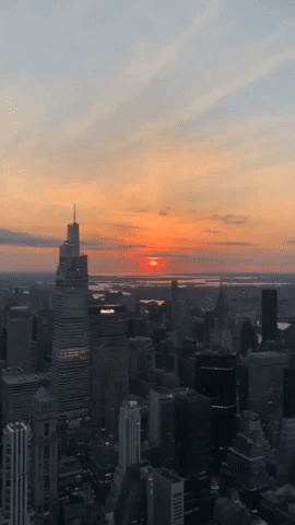 'Ring of Fire' Partial Solar Eclipse Shines Red Above Manhattan