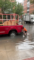Vehicle Pushed Through Tropical Storm Fay Floodwater in Hoboken