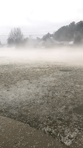 Fog Drifts Over Hail After Alabama Severe Storm
