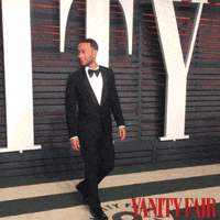 john legend shrug GIF by Vanity Fair
