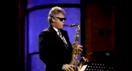bill clinton saxophone GIF