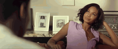 Movie gif. Chanel Iman as Lily in Dope rolls her eyes, chuckling and shaking her head.