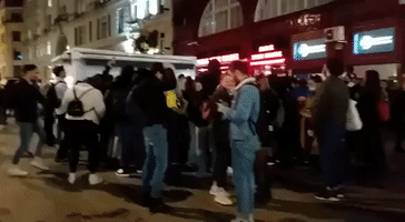 Revelers Congregate on London Streets Minutes After Curfew Closes Bars