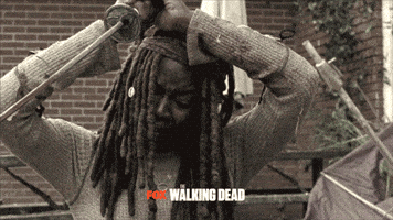 the walking dead pain GIF