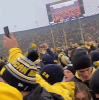 Michigan Fans Swarm Field After Beating OSU