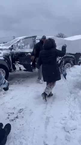 Bills Players Dig Cars Out of Deep Snow Upon Return to Buffalo