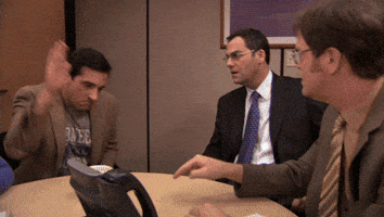 The Office gif. Michael slaps the desk violently and thrusts his hands in presentation, exclaiming with outrage "Thank you!"