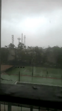 Powerful Cyclone Damages Tennis Court in India's Visakhapatnam