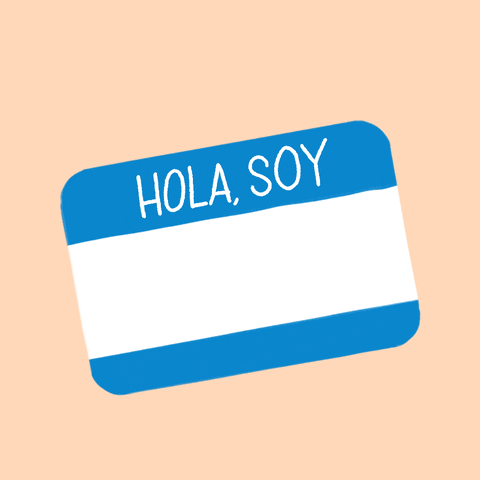Digital art gif. Blue and white name tag sticker against a peach background. The name tag reads, “Hola, Soy, #MailReady.”