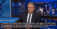 shooting jon stewart GIF