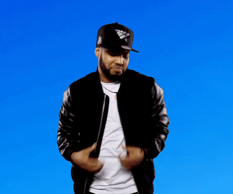 Video gif. Mr. Paradise wears a black baseball hat and bomber jacket as he shrugs casually with his arms out and his face turned down in a frown.
