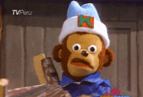 TV gif. A wide-eyed monkey puppet twists their mouth in shocked confusion as we zoom into his expression.