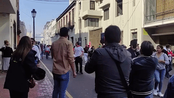 Protesters Seen Washing Eyes After Police Respond to Demonstrations in Central Lima