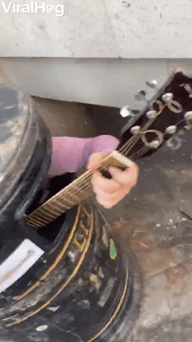 Garbage Can Guitar Man