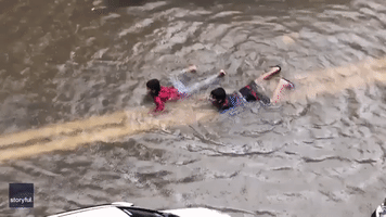 Mumbai Kids Swim in Street as Monsoon Weather Hits City