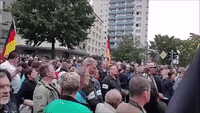 Demonstrators Holding German Flags Gather in Chemnitz