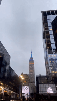 Empire State Building Shines Yellow and Blue for Ukraine, Marking a Year of War