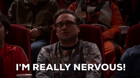 Big Bang Theory gif. Johnny Galecki as Leonard sits next to Kunal Nayyar as Raj in a packed movie theater. Leonard looks over to Raj with a nervous expression. He says, “I'm really nervous.”