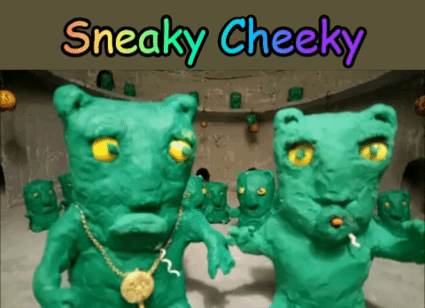 christmas grumps poking out tongue GIF