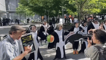 Climate Activists Dressed as Orcas Demonstrate Outside Citigroup Offices