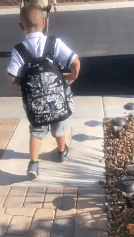 Las Vegas Police Escort 4th Grader to School After Father Dies of Coronavirus