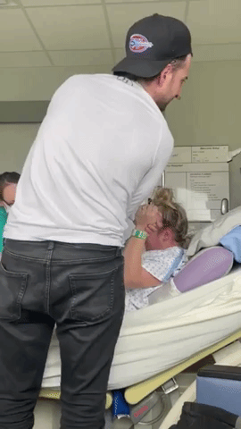 Husband Gags and Sits Down as Wife Gives Birth
