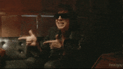 the strokes finger guns GIF