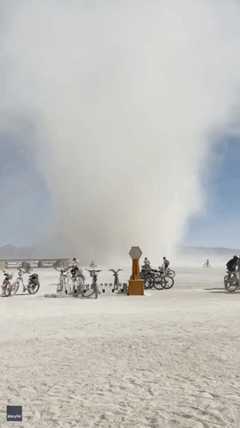 Dust Devil Swirls at Burning Man Before Storms Leaves Attendees Stranded