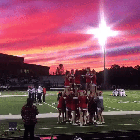 High School Cheerleaders Perform Routine in Front of Glorious North Carolina Sunset