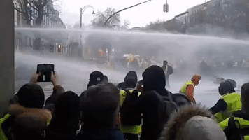 Tear Gas and Water Cannons Used Against 'Yellow Vest' Protesters in Brussels