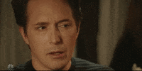 SNL gif. Beck Bennett's face subtly transitions from mildly confused to bewildered, as if he had a sudden realization.
