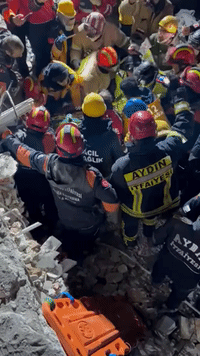 International Rescue Teams Work Together to Save Mother and Son From Rubble in Turkey