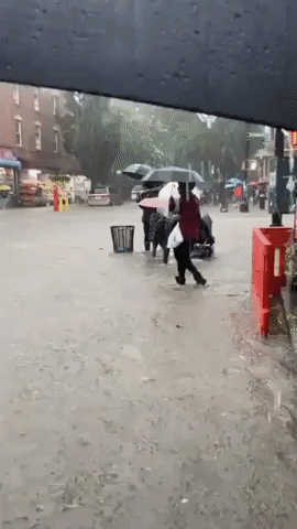 New Yorkers Trudge Through Ankle-Deep Water as Flash Flooding Soaks City