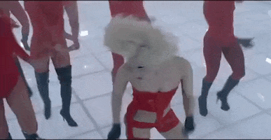 lady gaga hair flip GIF