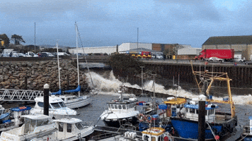 Storm Ciaran Floodwater Gushes Into Northern Irish Harbour
