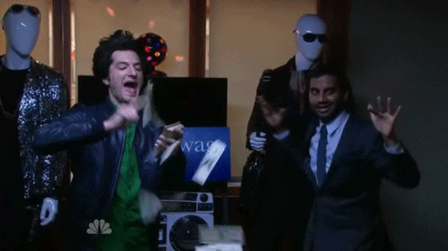 parks and recreation making it rain GIF
