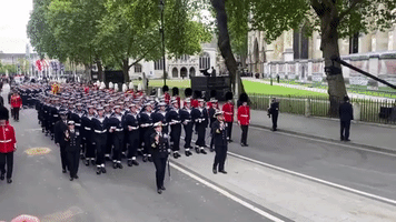 Queen's Coffin Arrives in Procession