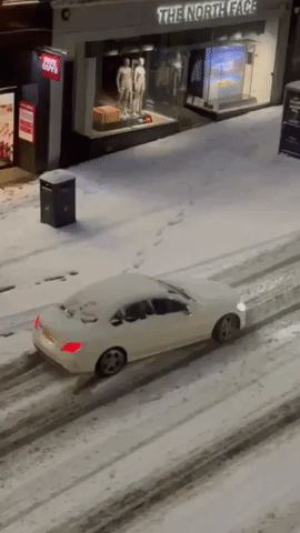 Car Stuck on Edinburgh Street as Snow Causes Travel Chaos