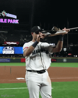 kingkaps7 giphyupload kingkaps7 mariners cal raleigh big dumper homers 50 holding vedder cup guitar GIF