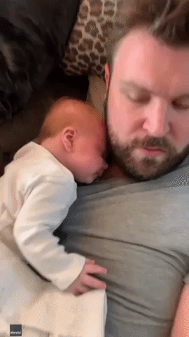 Baby Girl Cannot Get Enough of Dad's Beard