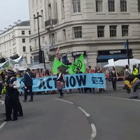 Extinction Rebellion Demonstrators March to Parliament from Marble Arch
