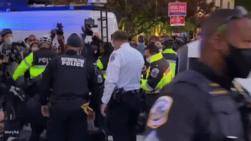 Man Handcuffed by Police as Election Night Protests Erupt in DC