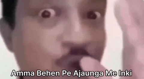 Video gif. Low quality video of a man looking at us with wide, panicked eyes and shaking his hand as he says, "Amma behen pe ajaunga me inki. Inki amma behen pe ajaunga main. Dimaag kharab ho jayega mera." 