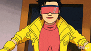 TV gif. A scene from the animated TV show "X-Men 97" shows an excited Jubilee with her sunglasses on pointing to herself with her thumbs as she leans in and says "Me." 
