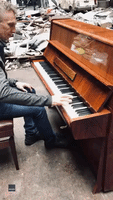 Man Plays Piano in Ruins of Historic Kharkiv Building