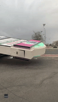 Fallen Billboard Crushes Parked Vehicle in Las Vegas During Strong Winds