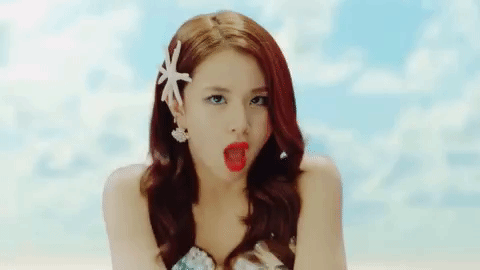 k-pop shrug GIF