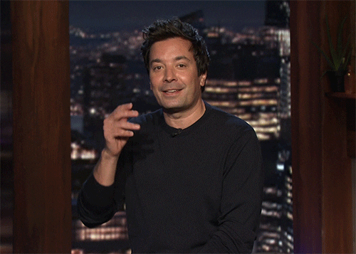 The Tonight Show gif. Jimmy Fallon stares at us well a deadpan look as he stirred an imaginary cup of tea. He says, “well, well, well.” He can't keep his composure and tries to hold in his laughter. 