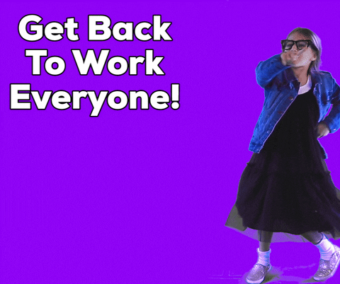 Video gif. A girl in thick black glasses and a jean jacket slides on screen with 1 hand on her hip and a finger pointing back where she came from. She claps her hands together decisively and says,"Get back to work everyone. Come on! Let's go! Move it!"