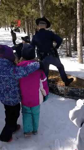 Michigan State Troopers Take a Canoe Ride Through Snow